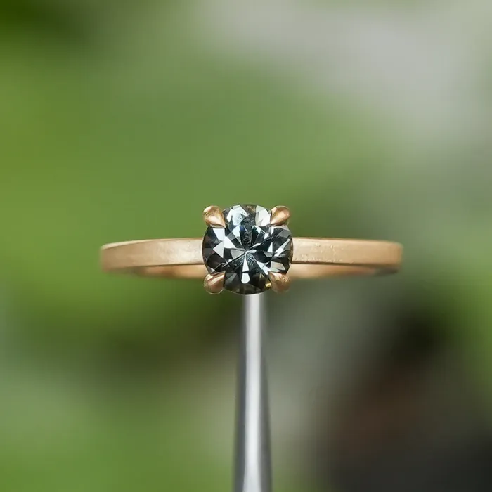 092ct ColorShifting Songean Sapphire Flat Band 4 Prong Solitaire in 18k Yellow Gold Quest Minerals Rings