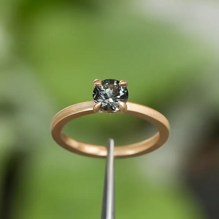 092ct ColorShifting Songean Sapphire Flat Band 4 Prong Solitaire in 18k Yellow Gold Quest Minerals Rings