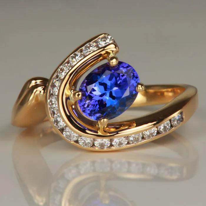 Moriartys Gem Art Rings 14K Yellow Gold Oval Tanzanite and Channel Set Diamond Ring 145 Carats
