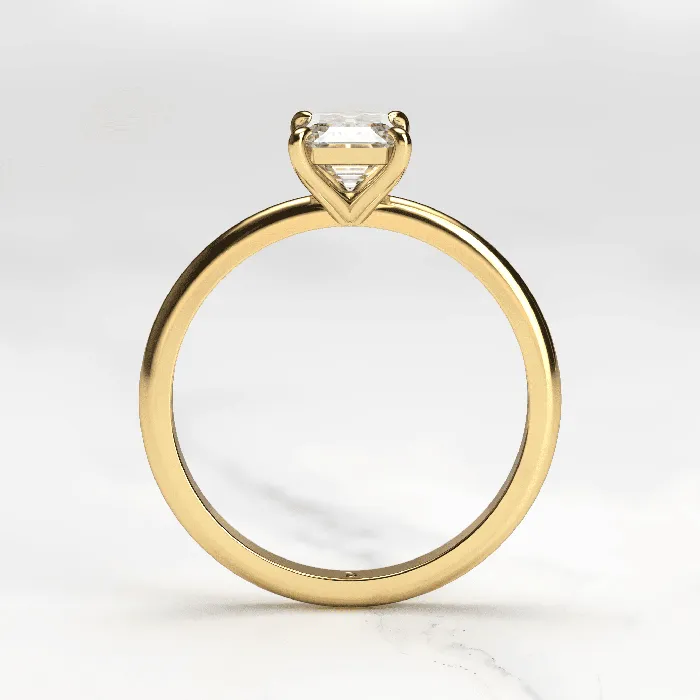 Capucinne Rings Emerald Tapered Solitaire Diamond Ring