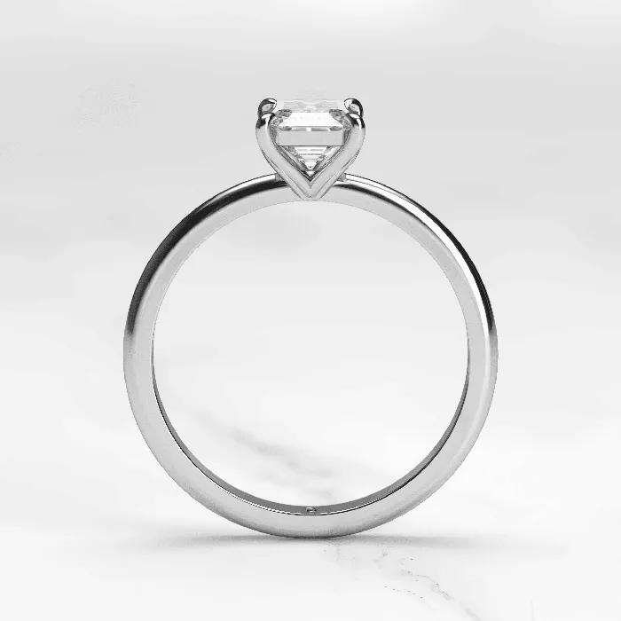 Capucinne Rings Emerald Tapered Solitaire Diamond Ring