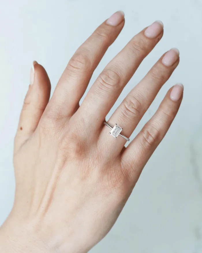 Capucinne Rings Emerald Tapered Solitaire Diamond Ring