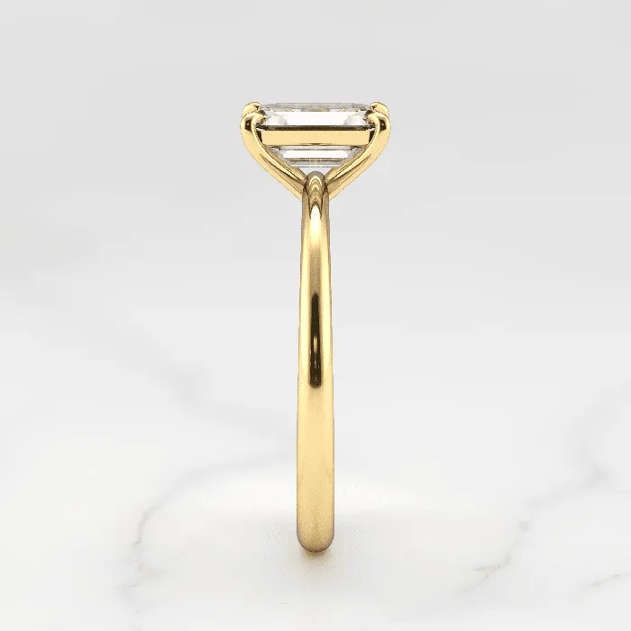 Capucinne Rings Emerald Tapered Solitaire Diamond Ring