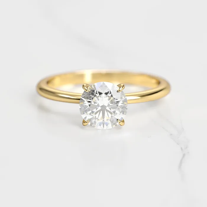 Capucinne Round Solitaire Diamond Ring Rings