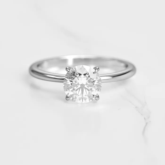 Capucinne Round Solitaire Diamond Ring Rings