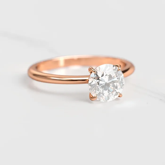 Capucinne Round Solitaire Diamond Ring Rings