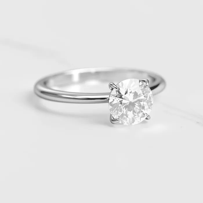 Capucinne Round Solitaire Diamond Ring Rings