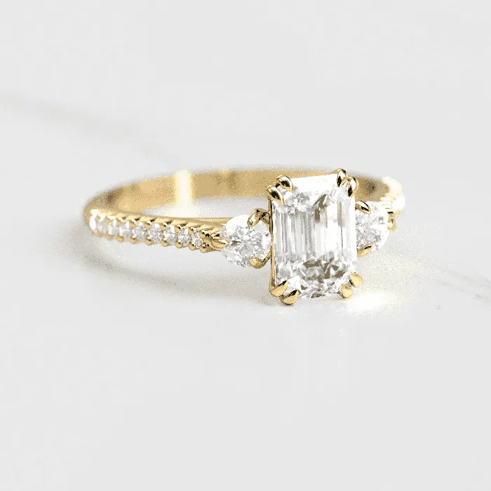 Emerald cut moissanite engagement ring Capucinne Rings