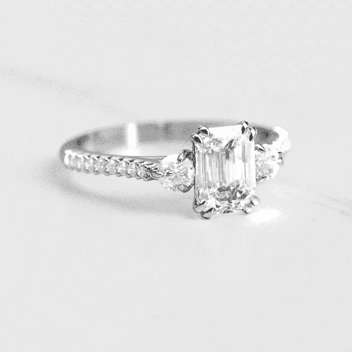 Emerald cut moissanite engagement ring Capucinne Rings