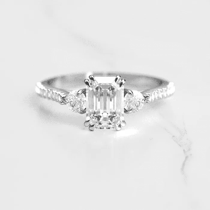 Emerald cut moissanite engagement ring Capucinne Rings