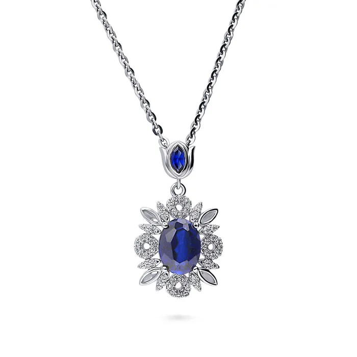 Flower Halo Simulated Blue Sapphire CZ Set in Sterling Silver BERRICLE Rings