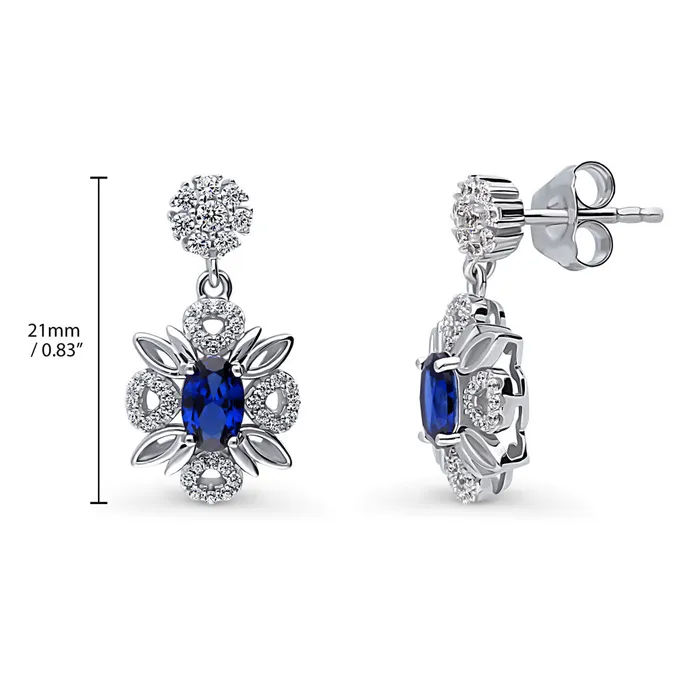 Flower Halo Simulated Blue Sapphire CZ Set in Sterling Silver BERRICLE Rings