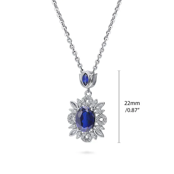 Flower Halo Simulated Blue Sapphire CZ Set in Sterling Silver BERRICLE Rings