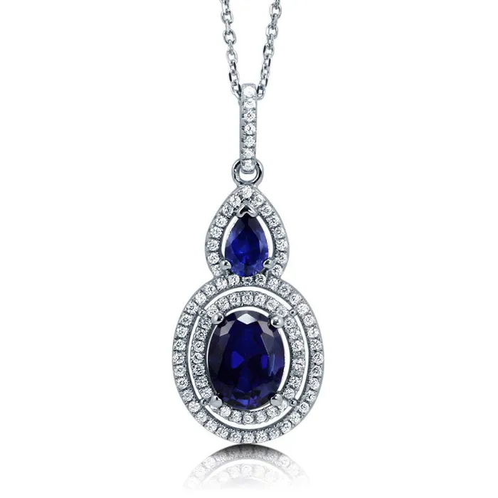 Halo Simulated Blue Sapphire Oval CZ Necklace in Sterling Silver BERRICLE Necklaces