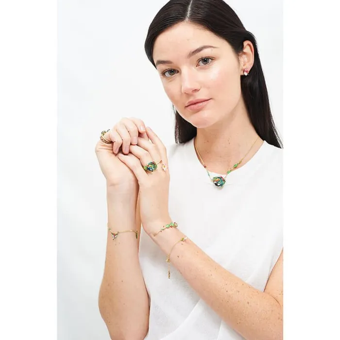 Les Nereides Bracelets Les Nereides Tropical Leaves Hummingbird And Carved Cristal Charm Bracelet