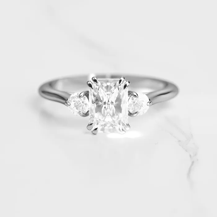 Radiant Diamond Ring with Accent Stones Capucinne Rings