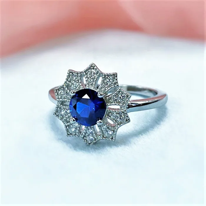 Rings BERRICLE Flower Halo Blue CZ Ring in Sterling Silver