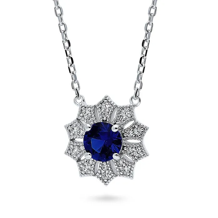 Rings Halo Flower Blue CZ Set in Sterling Silver BERRICLE